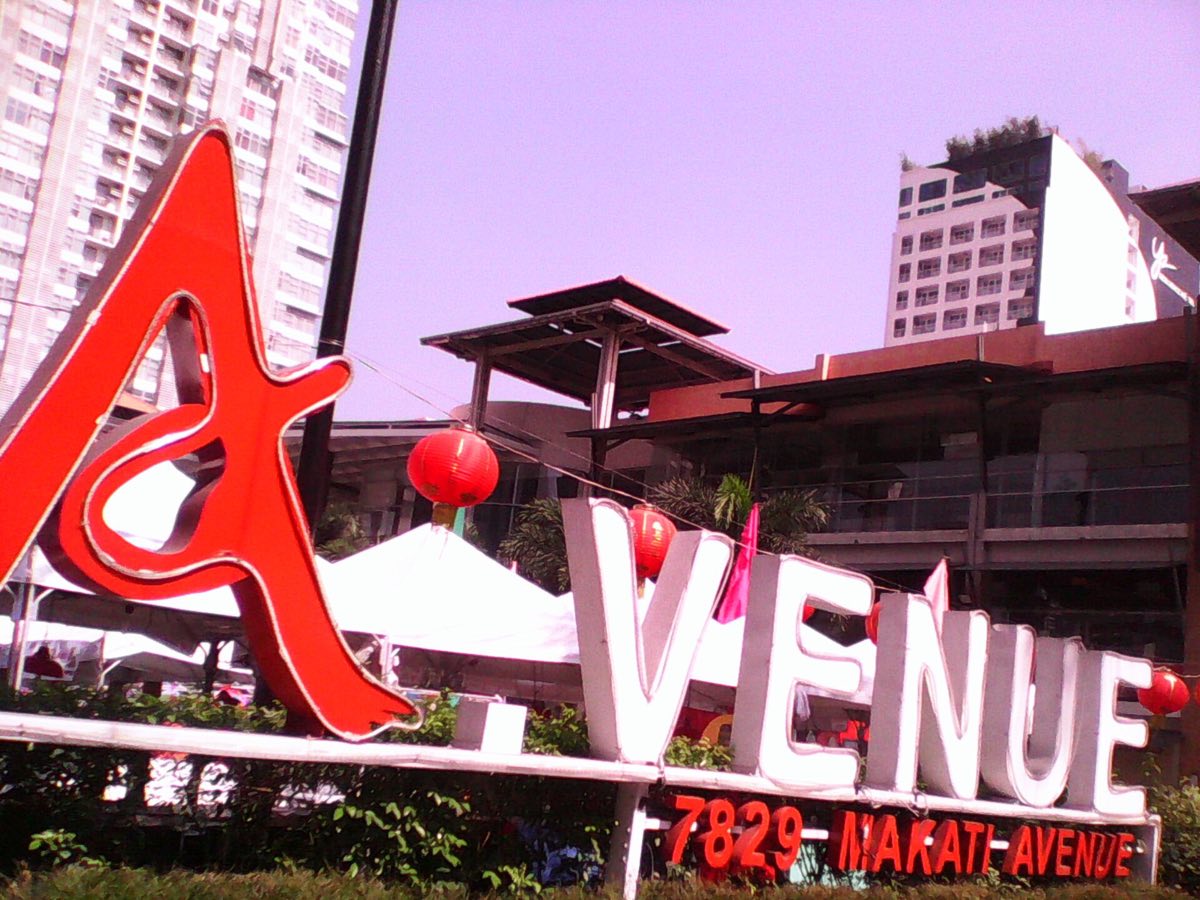 Neon signage on a street in Poblacion, Makati, at night